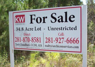large real estate signs